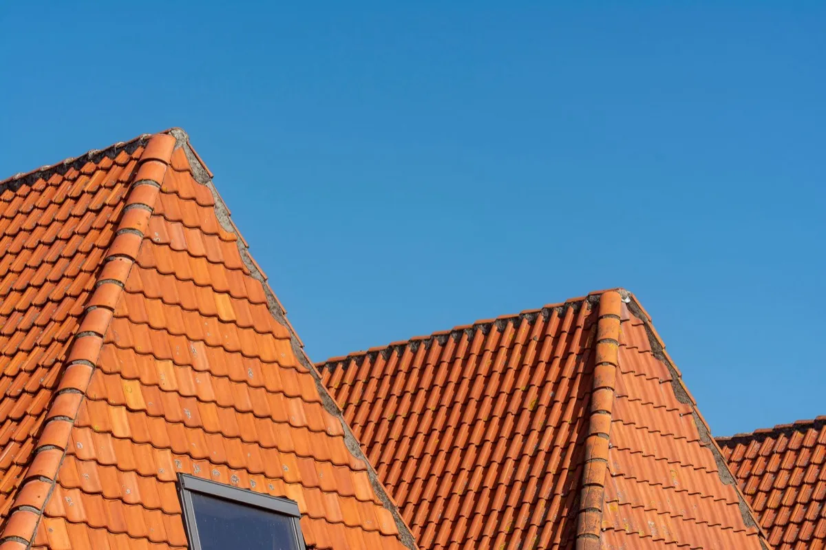 Clay barrel tile rooflines on homes in Erie, PA